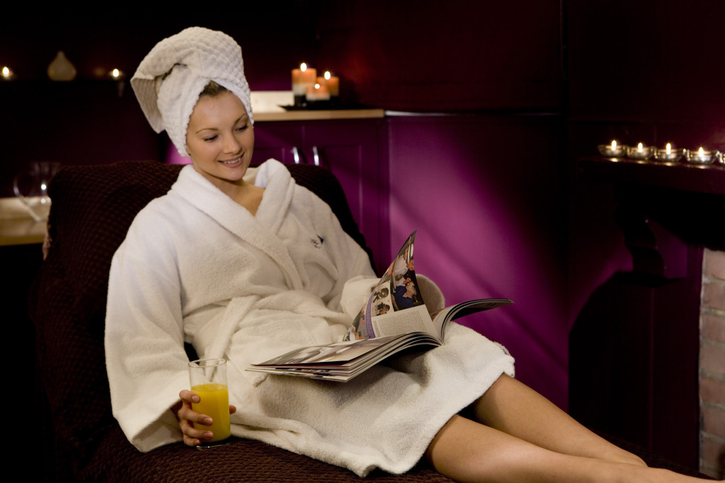 Woman relaxing in Wren's Club's beauty room